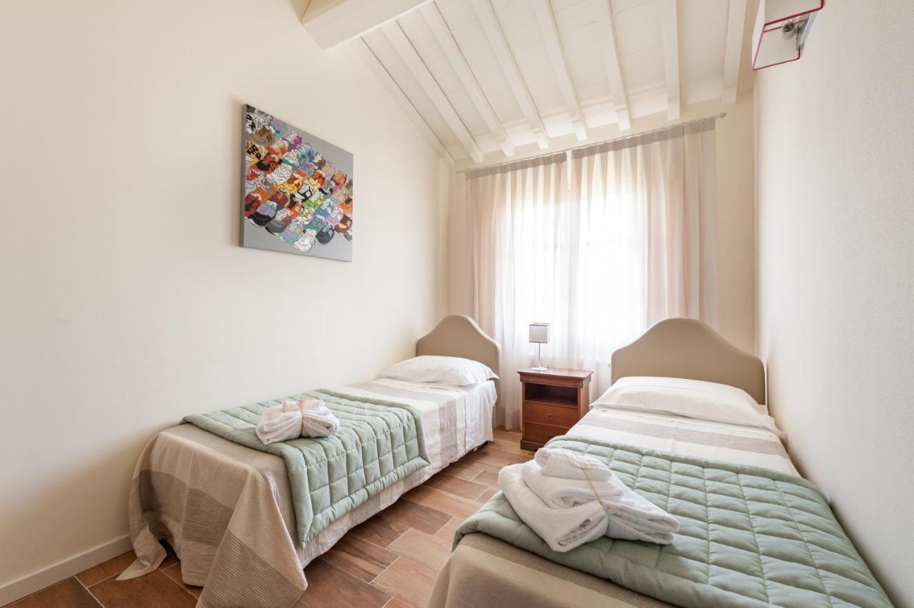 Le Residenze Appartement Chianni Buitenkant foto