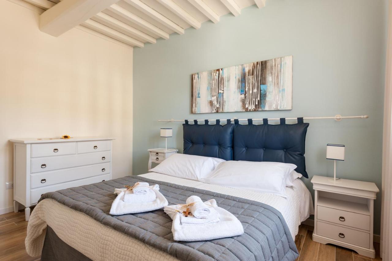 Le Residenze Appartement Chianni Buitenkant foto