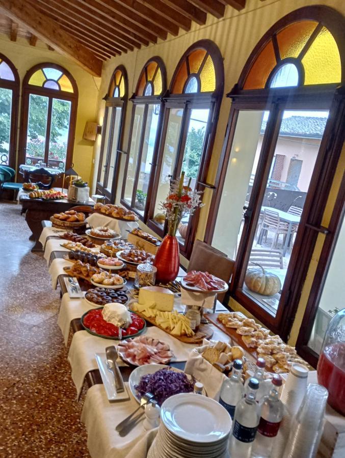 Le Residenze Appartement Chianni Buitenkant foto