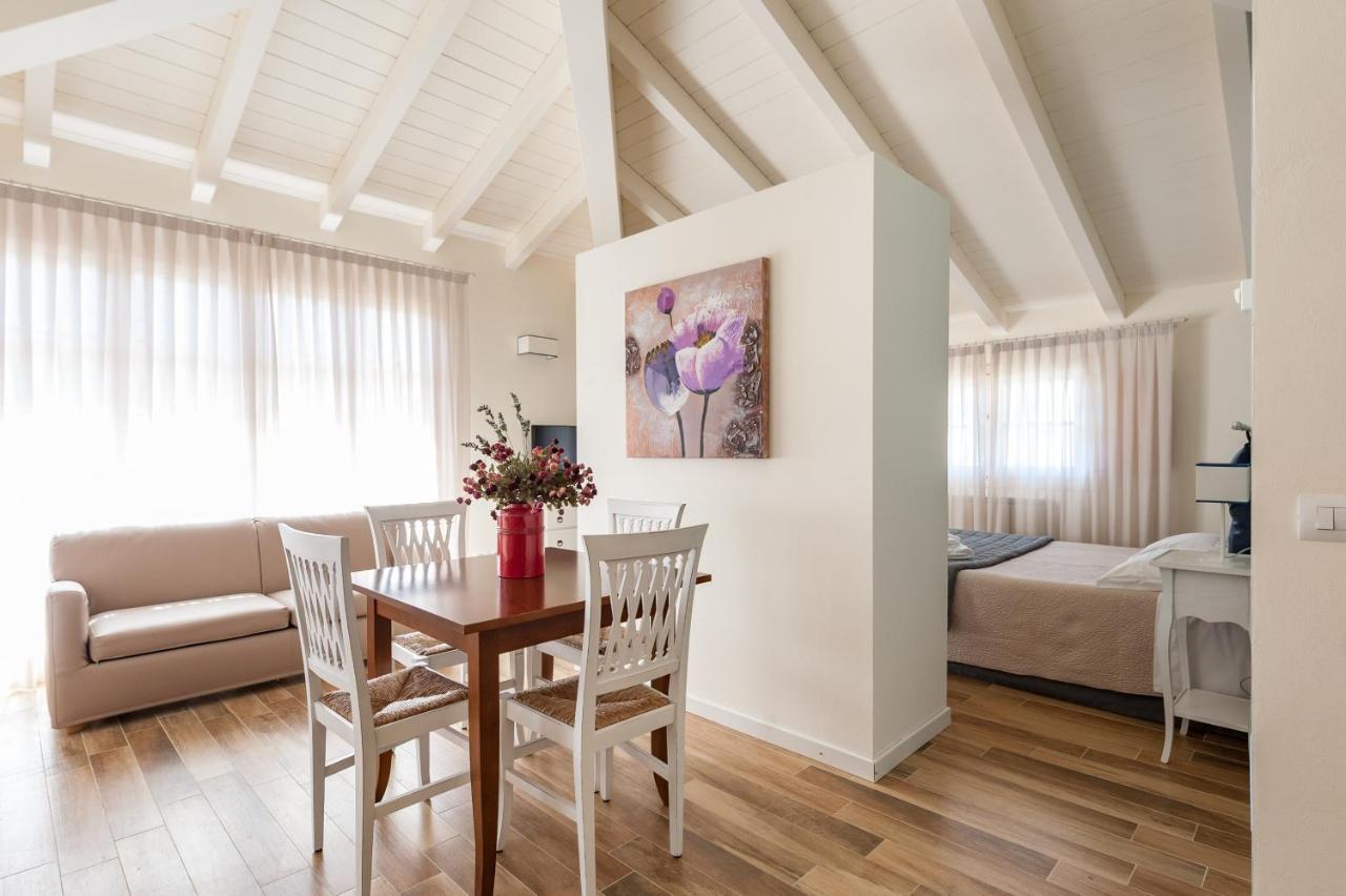 Le Residenze Appartement Chianni Buitenkant foto