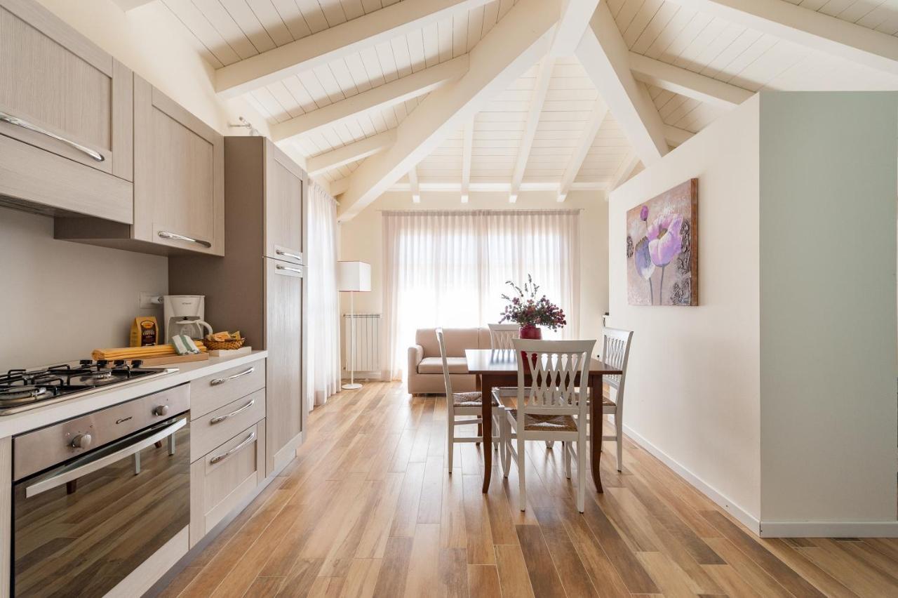 Le Residenze Appartement Chianni Buitenkant foto