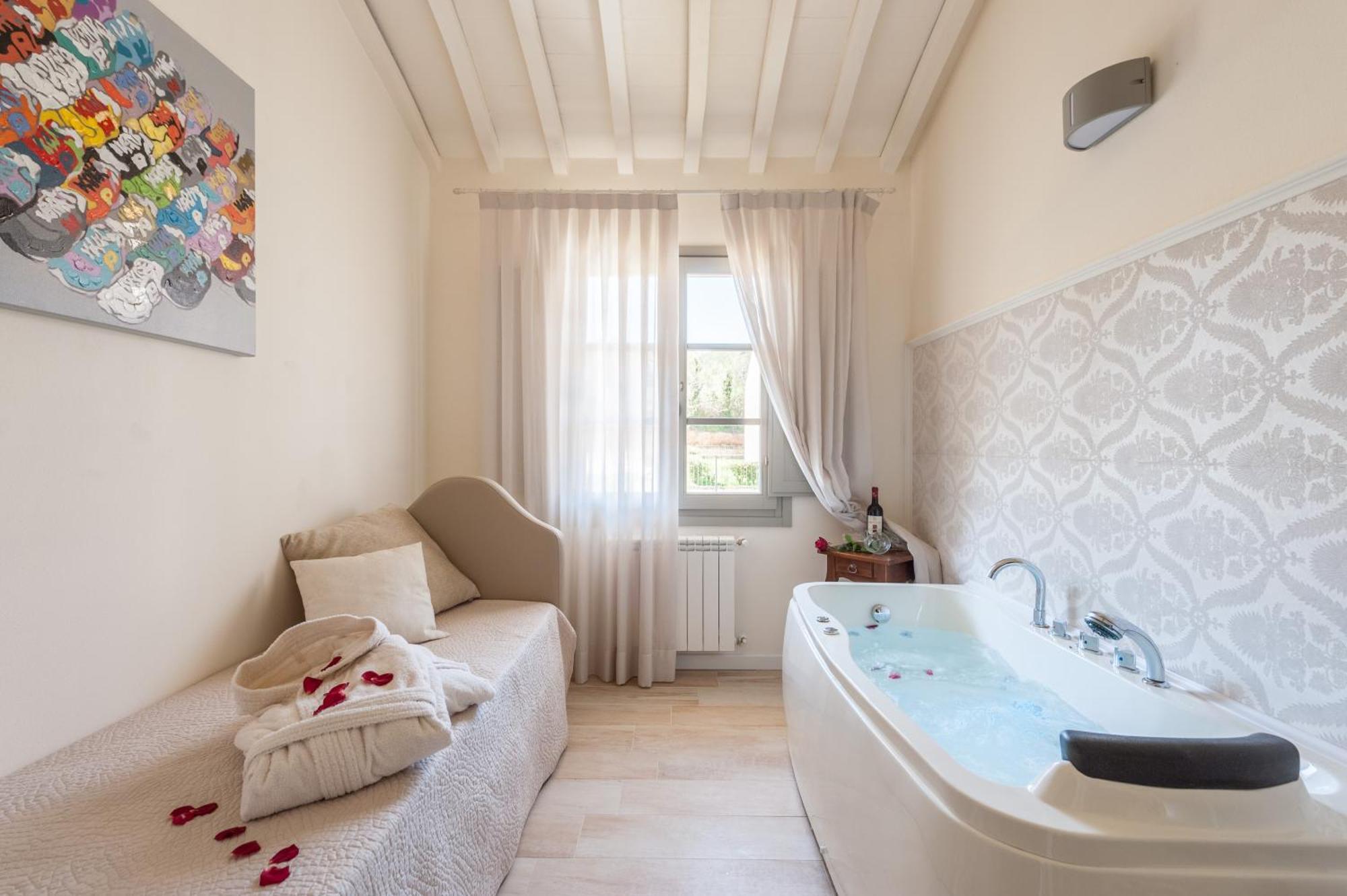 Le Residenze Appartement Chianni Buitenkant foto
